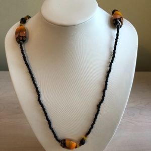 Handmade Black Beaded Necklace with Sunkist, Amber, and Black Colored Beads